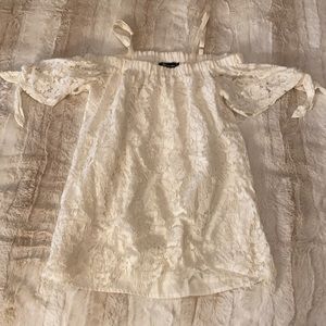 white off the shoulder top with lace.